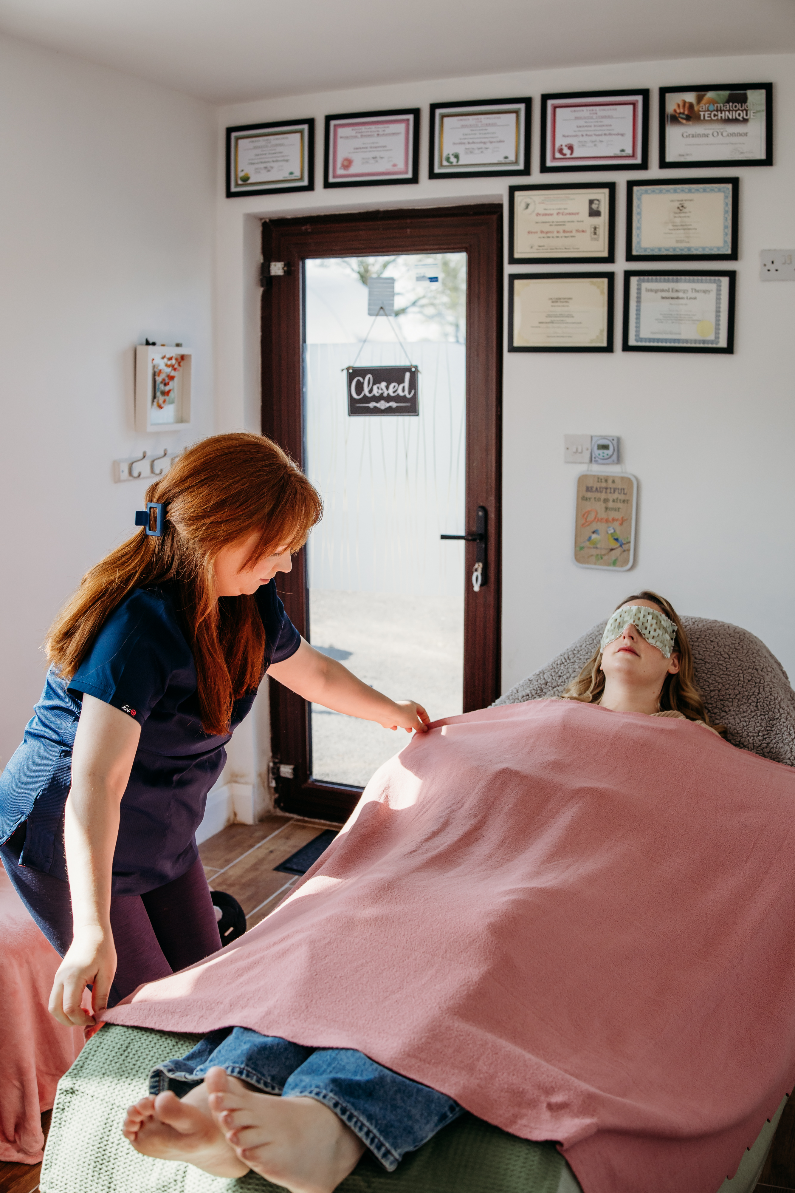 grainne settles fertility client into her calm treatment space for fertility reflexology in claregalway county galway